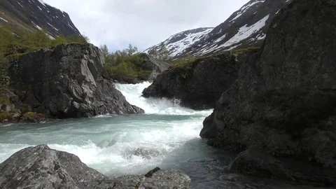 Torrent stream snow mountains Stock Footage 77339010