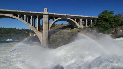 Torrential flow over Lower Falls in downtown Spokane after heavy rains 4K. Stock Footage 199864454
