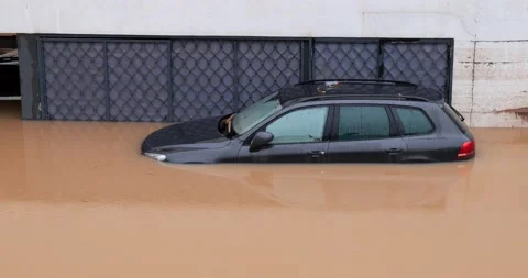 Torrential rain causes flash floods in the city area Video stock 170178705