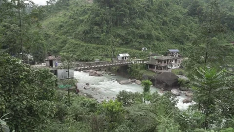 A torrential river flows through the mountainous region Stock Footage 250117135