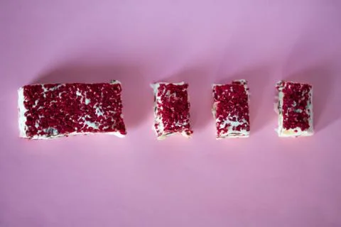 Torrone or nougat bar with nuts and red dried berries Stock Photos