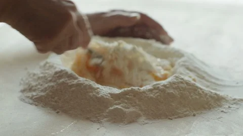 Tortellini, Beat the eggs in the flour 스톡 동영상 129595673