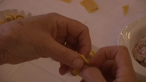 Tortellini, the closure (hand) Video stock 109608337