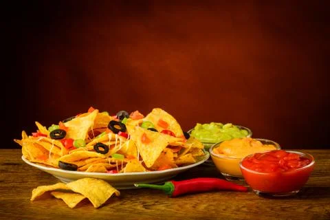 Tortilla chips with dip Stock Photos