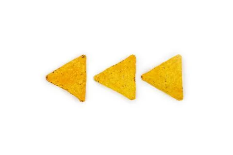 Tortilla corn chips, triangle, nachos isolated on white background. Stock Photos