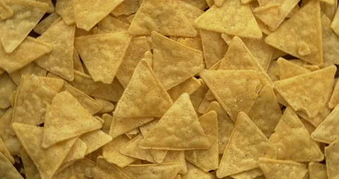 Tortilla nacho corn chips as texture. Table spin. Stock Footage 278242889