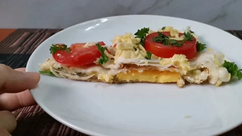 Tortilla Wraps or Quesadilla Slice with Fresh Tomatoes and Melted Cheese Stock Footage 162876558