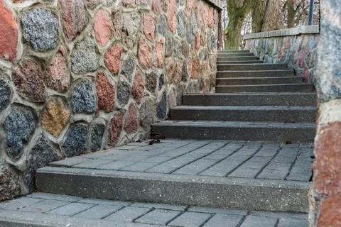 Tortuous ascent of the stone steps Stock Photos