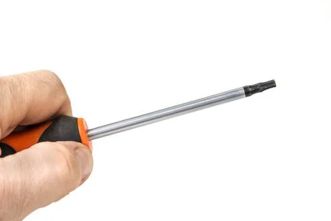 Torx screwdriver with plastic handle on the white Stock Photos