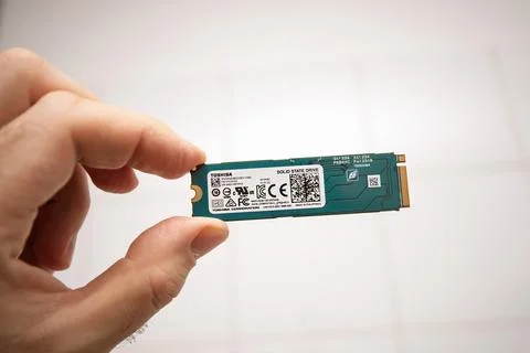Toshiba M.2 NVMe Solid-State Drive in Hand Stock Photos