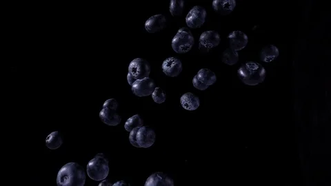 Tossed blueberries Stock Footage 129904657
