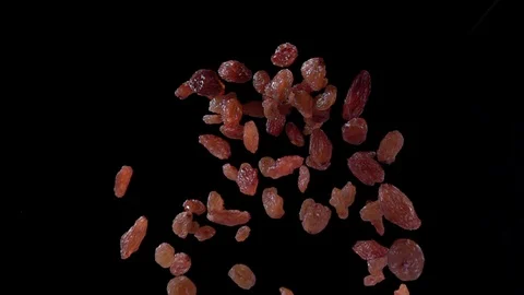 Tossed raisins Stock Footage 129908839