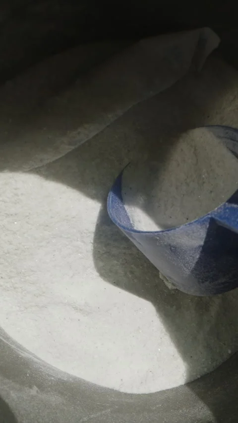 Tossing the blue scoop back into the pre-workout powder jar, deciding against Stock Footage 283789451