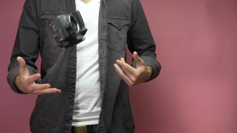 Tossing a camera, broken camera Stock Footage 124821469