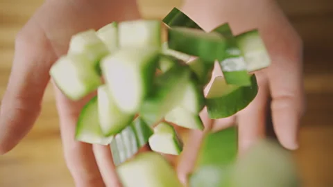 Tossing cherry tomatoes, red grapes, cucumber, parsley. Slow Motion. Stock Footage 135430814