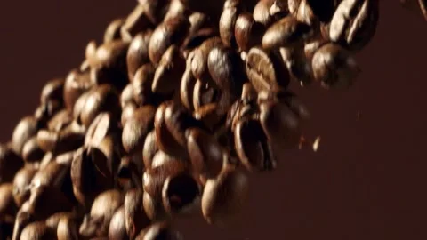 Tossing Coffee Beans In The Beans Close-up, slow motion 300 fps Stock Footage 151622596