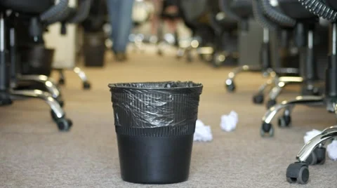 Tossing crushed paper into garbage, 4k UHD 2160p, dolly slider shot Video stock 64775342