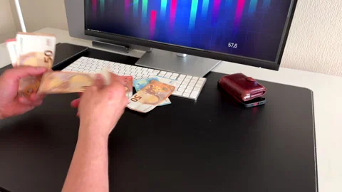 Tossing Euro Notes in Work Environment with Charts Stock Footage 308287499