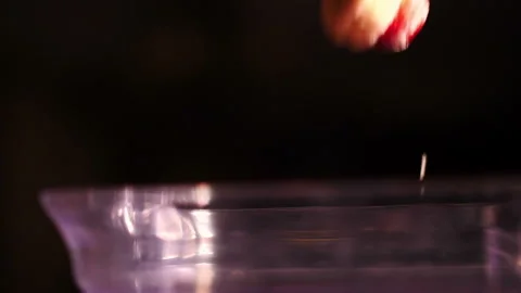 Tossing fresh fruit into blender or liquidiser with motion blur Stock Footage 153755073