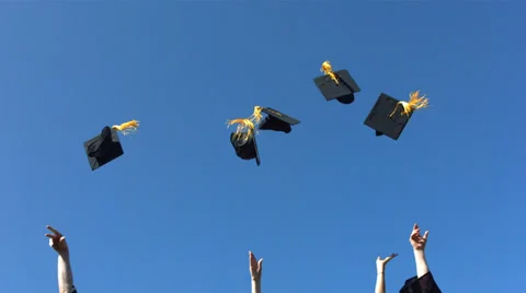 Tossing graduation caps, slow motion Stock Footage