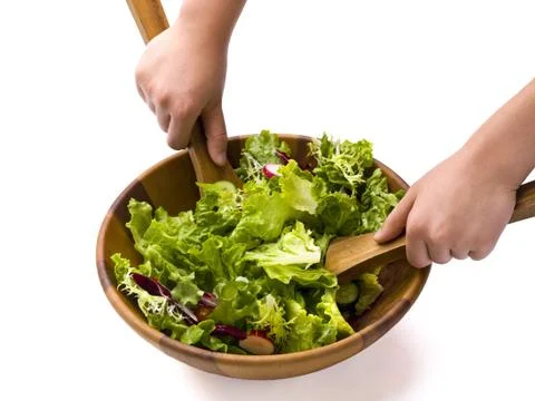 Tossing salad Stock Photos