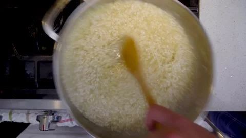 Tossing &amp; Stirring Risotto Rice Video stock 139233049