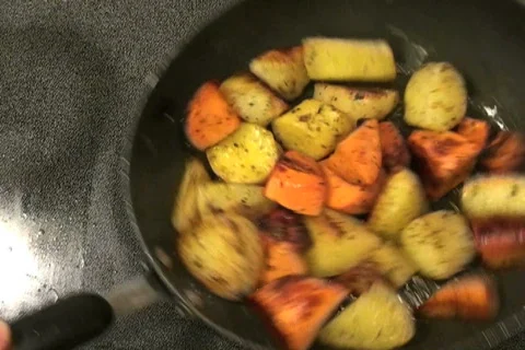 Tossing vegetables - NTSC Stock Footage 680558