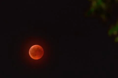The total eclipse of the moon, the bloody moon at night. Photos