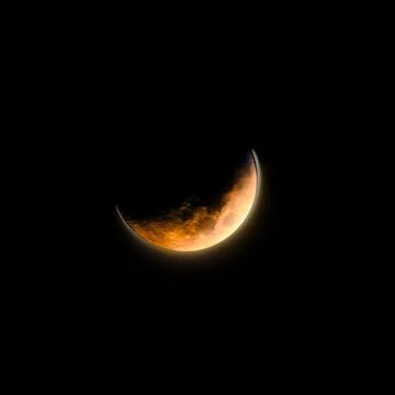 Total lunar eclipse with the moon obscured in dark sky Fotos Stock