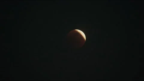 Total lunar eclipse. Partial Lunar Eclipse after its maximum contact. Stock Footage 197427707