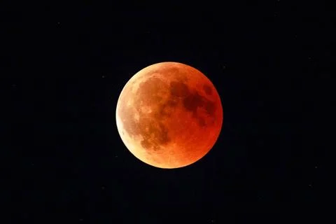 Total red lunar eclipse Moon eclipse in full moon and super moon by night.... Stock Photos
