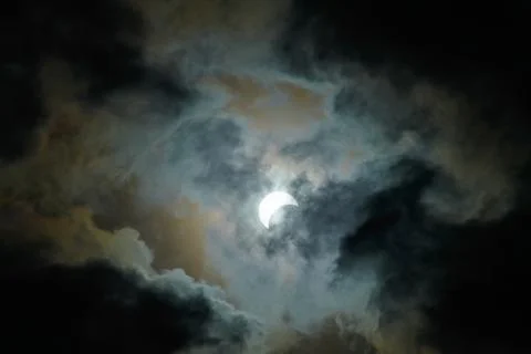Total Solar Eclipse Against a Cloudy Sky Stock Photos