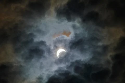 Total Solar Eclipse Against a Cloudy Sky Stock Photos