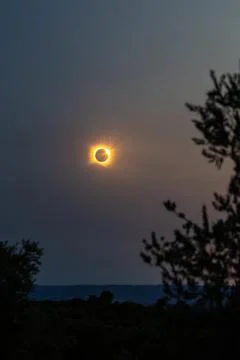 Total solar eclipse appearing in the sky over Lleida, Spain Stock Photos