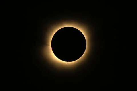 Total solar eclipse of April 8th 2024. Red prominences and bright corona during Stock Photos