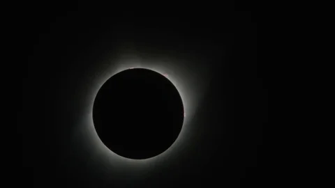 Total solar eclipse changing to reveal lens flare / Driggs, Idaho, United States Stock Footage 83189917