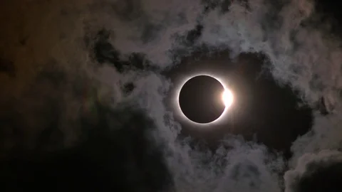 Total Solar Eclipse - Diamond Ring Through Break in Clouds (short) Stock Footage 82552416