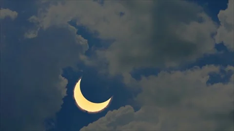 Total solar eclipse with heap white cloud blue sky look like shape heart ti.. Stock Footage 268602435