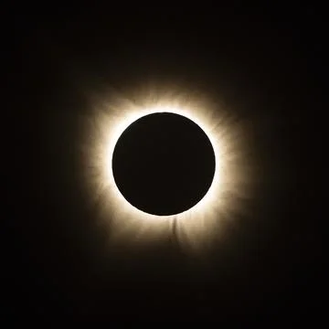 Total solar eclipse with moon visible in the sky Stock Photos