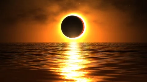 Total solar eclipse reflecting on calm ocean water at sunset. 4K Video stock 343243962