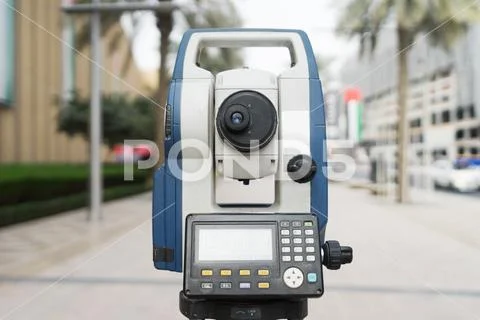 Total station with busy road in modern city Stock Photos