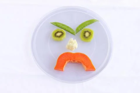 Total vegetable faces mad Stock Photos