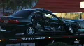 A Totaled Wrecked Car On A Flatbed Tow Truck At Night HD Footage