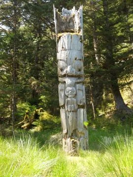 Totem with bent-box on top Stock Photos
