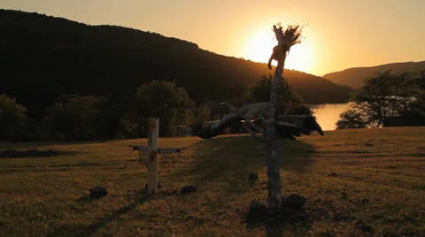 Totem sculptures at sunset Stock Footage 33878073