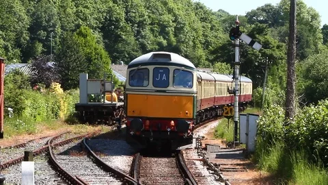 Totnes, Devon, England: A Class 33 diesel engine arrives at the station Stock Footage 90398187