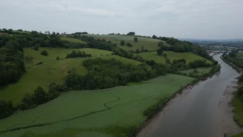 Totnes, S. Devon, England: DRONE VIEWS: Looking northwards from the River Dart Stock Footage 243989030
