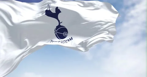 Tottenham Hotspur flag waving in the wind on a clear day Stock Footage 200417296