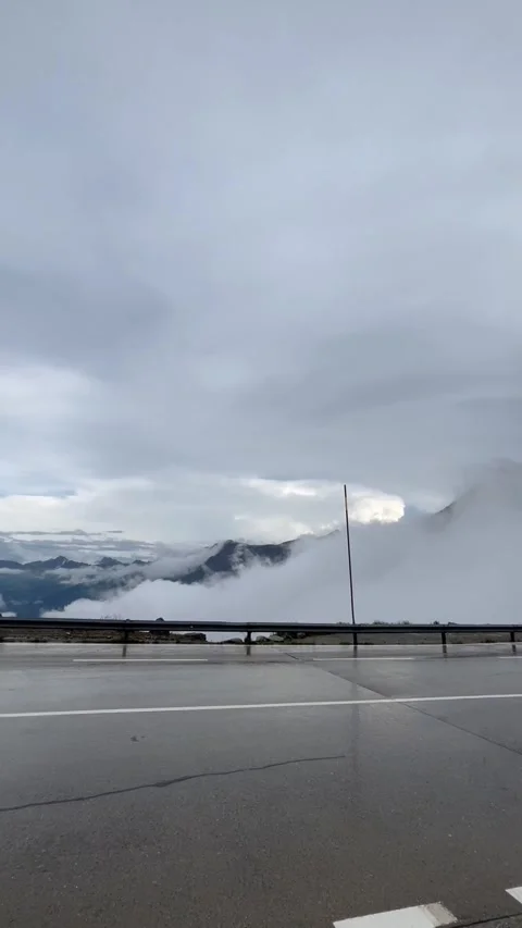 Touch the clouds in the swiss mountains Stock Footage 343677186