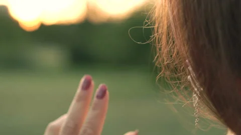 Touch of the earring Stock Footage 94008228